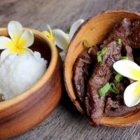 Keiki Beef Bowl · Grilled teriyaki beef served with 1 & 1/2 scoops of rice.  There are no substitutions for th...