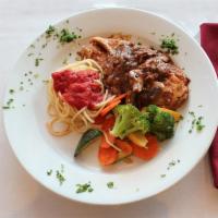 Marsala  · Chicken scaloppini sauteed with mushrooms in a Marsala wine sauce. Served with a side of pas...