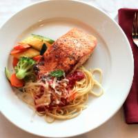 Salmon  · Atlantic salmon blackened or grilled and served in a lemon white wine sauce. Served with a s...