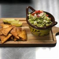 Guacamole Fresco · A fresh combination of avocados, lime juice, chopped onion, tomato, and cilantro. Served wit...