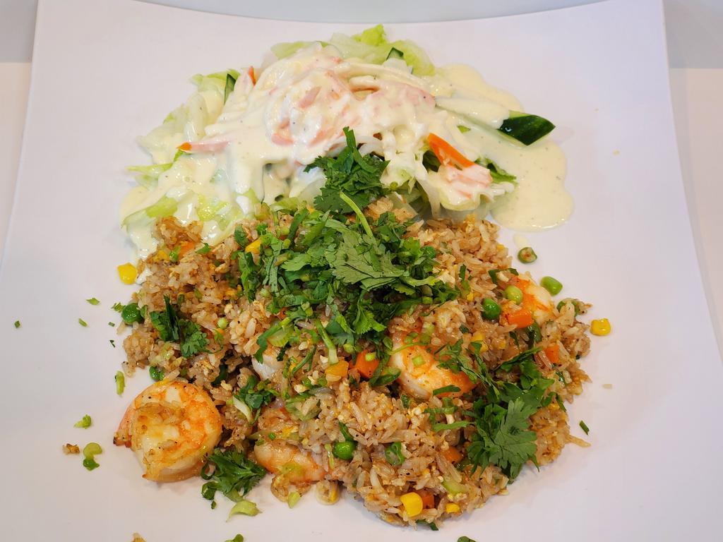 31. Shrimp Fried Rice · 6 pieces shrimp.
Served w/salad - topped w/scallion & cillantro