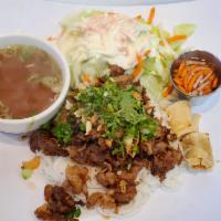 36. BBQ Pork with Spring Roll · 1 piece.
Served w/salad, vermicelli noodle
Crushed peanut, sauteed shallots, fish sauce