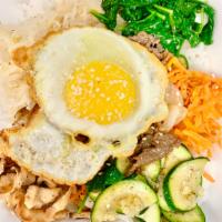 22. Bi-Bim-Bap · Served with rice, beef or chicken, egg, mushroom, carrots, zucchini, spinach and bean sprouts 