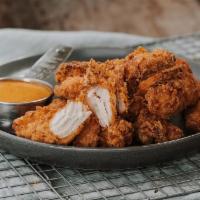 TWISTED TENDERS · Chicken tenders marinated in buttermilk for 24 hours and breaded in our Twisted seasoned flo...