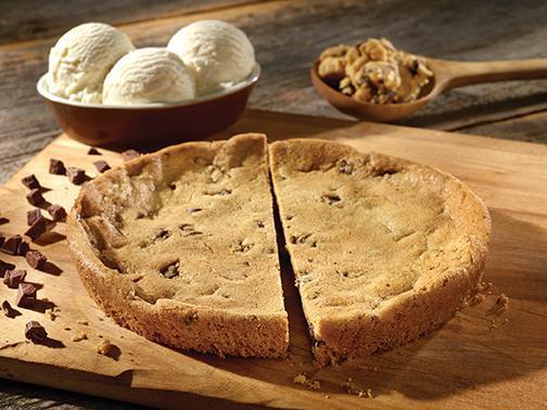 THE BIG COOKIE · All-butter cookie dough with giant morsels of chocolate freshly baked in our deep-dish pizza pan. 