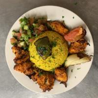 Chicken Kabob · Baked chicken and vegetables , served with rice and Jineen Salad ( Cucumbers , fresh parsley...