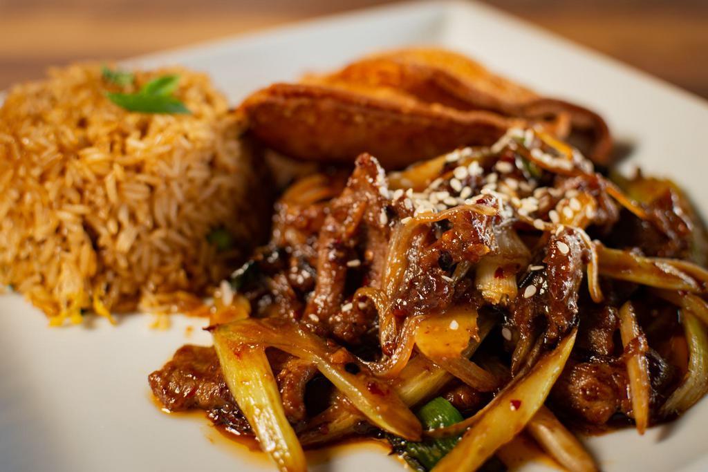 Mongolian Steak Dinner · Celery and Onions stir-fried in our house brown sauce then topped with toasted sesame seeds.