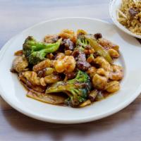 Triple Delight Dinner · Chicken, steak, shrimp, baby corn, water chestnuts, bamboo shoots, broccoli, celery, onion, ...