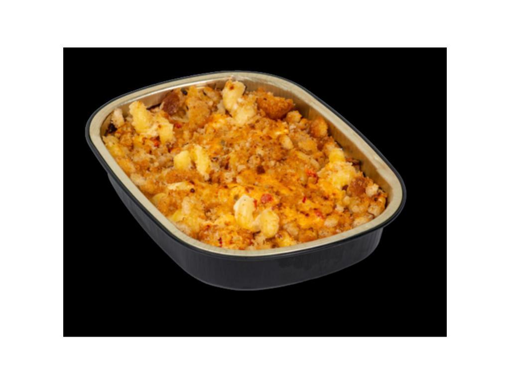Pimento Mac · Our Signature Three-Cheese Blend, Pimento Cheese, and Homemade Bread Crumbs.