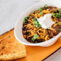 Beef Chili · Chili, cheddar cheese, chives, sour cream