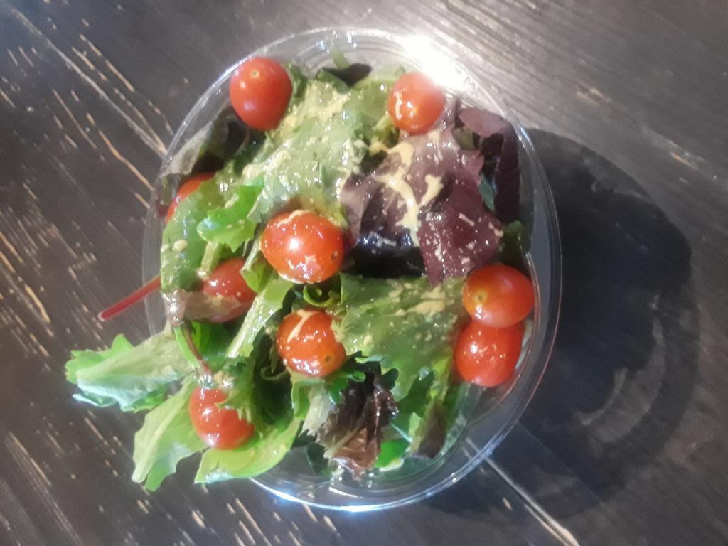 SA1. House Salad · Mini tomatoes and house vinaigrette. Made with mesclun mix.