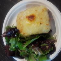 CM1. Croque Monsieur · White bread with bechamel sauce, French ham and melted Swiss cheese. Served with a side of m...