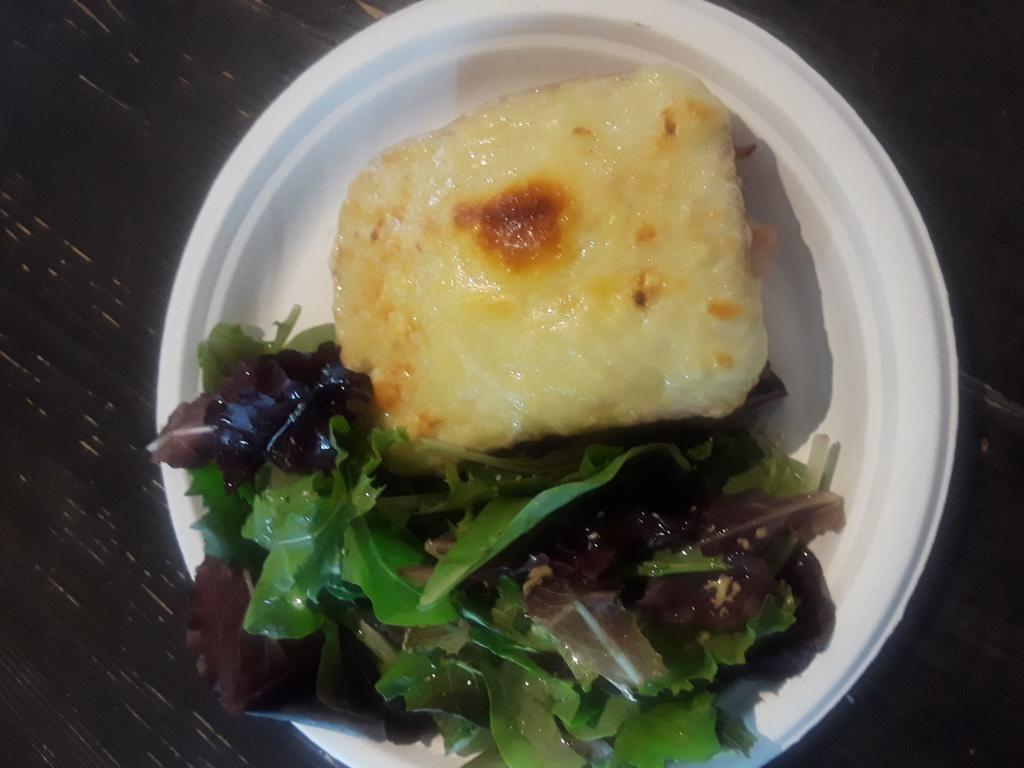 CM1. Croque Monsieur · White bread with bechamel sauce, French ham and melted Swiss cheese. Served with a side of mesclun mix salad.