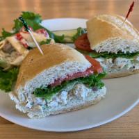 Left Bank Chicken Salad Sandwich · Roasted tarragon chicken salad, lettuce and tomato on a baguette 430c