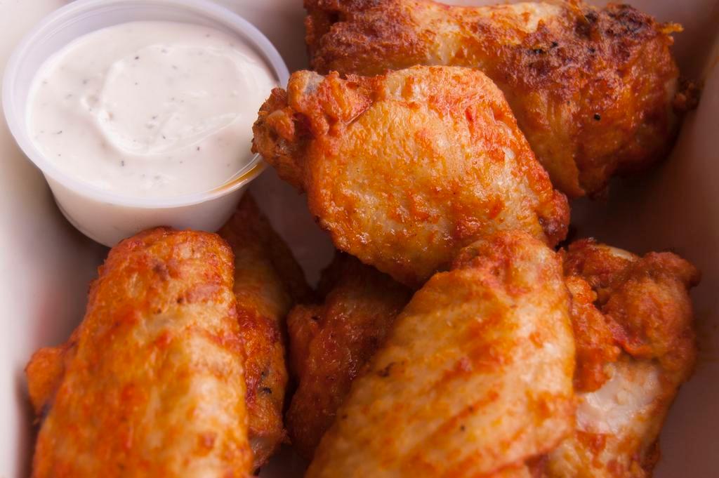Buffalo Wings · 6 baked wings, served with ranch.