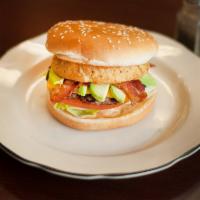Bacon Avocado Cheeseburger · ¼ lb. patty and cheese with bacon, avocado, 1000 Islands dressing, lettuce, tomato and onion...