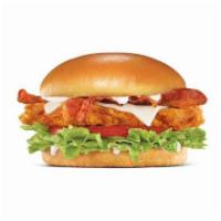 Hand-Breaded Bacon Swiss Chicken Sandwich · Premium, all-white chicken fillet, hand-dipped in buttermilk, lightly breaded and fried to a...