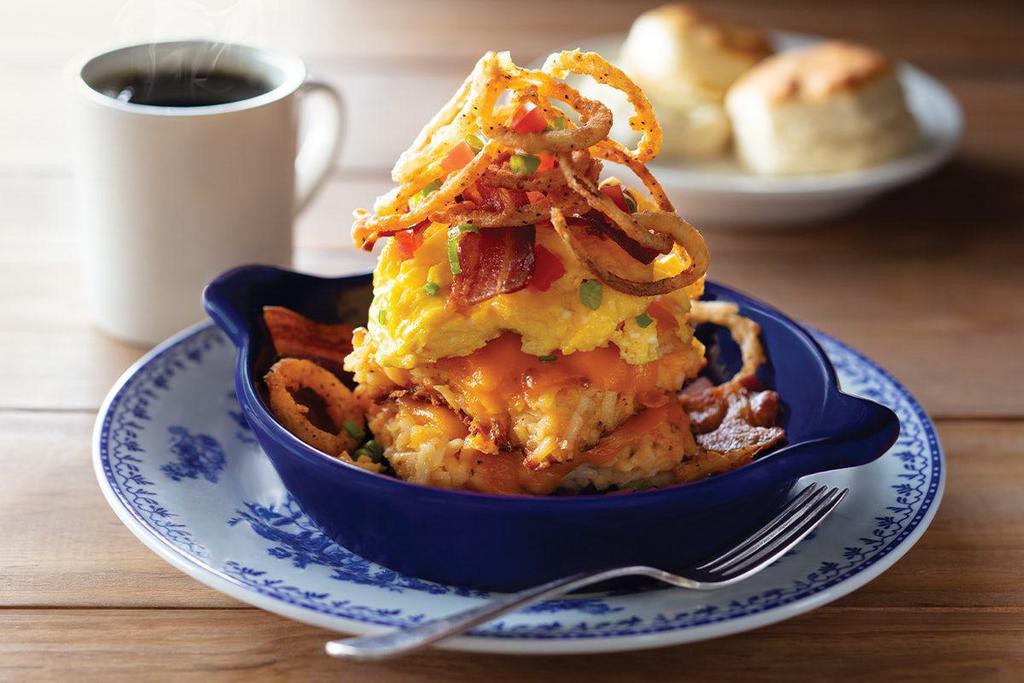 Bacon n’ Egg Hashbrown Casserole · Our scratch-made Hashbrown Casserole, hot off the grill and layered with pieces of crispy bacon, farm-fresh scrambled eggs, melted Colby cheese, fried onions, green onions, and fresh diced tomatoes. Served with Buttermilk Biscuits (160 cal each).




