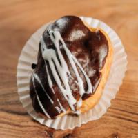 Eclair · Chocolate covered eclair with custard filling