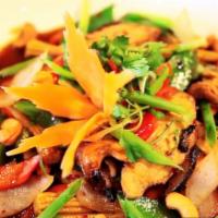 Cashew Grilled Chicken · Grilled sliced chicken breast, roasted cashews, vegetables and roasted chili sauce. Served w...