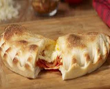 Small Cheese Calzone (Build your own) · Build your Calzone the way you want it. Cheese and sauce are included with your choice of two free toppings and $1.00 for each additional topping.