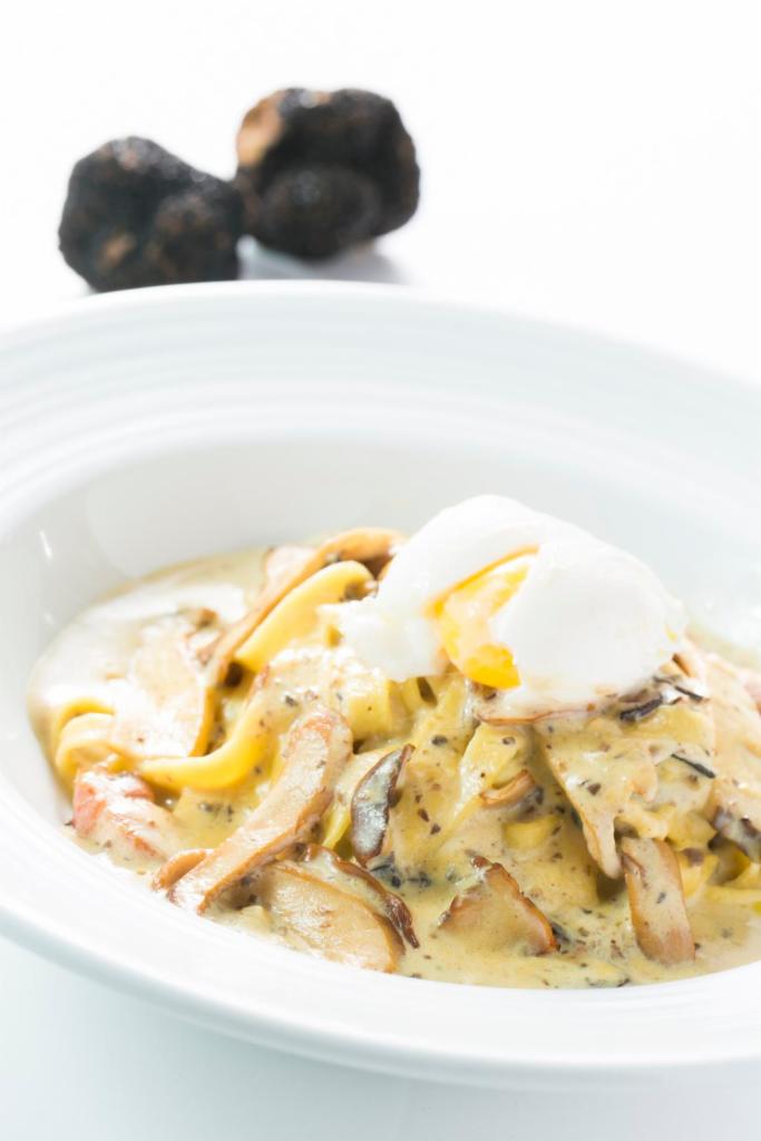 Truffle carbonara  · Fresh fettuccine pasta with mixed mushrooms, pancetta, poached egg and freshly shaved truffles 