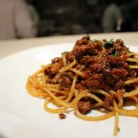 Bolognese “Moderna” · Spaghetti sauteed in chef hiro’s modern style meat sauce with a hint of balsamic vinegar.