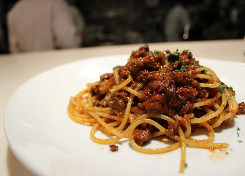 Bolognese “Moderna” · Spaghetti sauteed in chef hiro’s modern style meat sauce with a hint of balsamic vinegar.