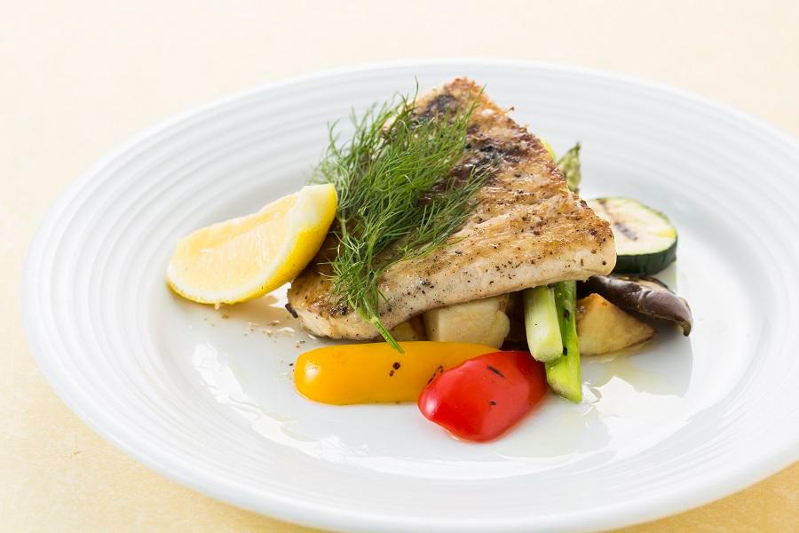 Grilled Monchong · Grilled local catch with lightly seasoned grilled vegetables finished with an oregano dressing.