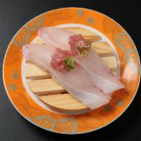 Hamachi Belly Special Nigiri · Sushi laid top of rice.
