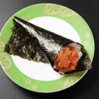 Spicy Tuna Temaki · Spicy tuna, cucumber hand roll.