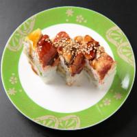 Dragon Roll (9 pcs) · Shrimp tempura roll topped with imitation crab, eel, and avocado.