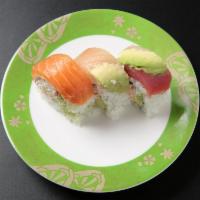 Rainbow Roll (9 pcs) · Imitation crab avocado roll topped with assorted fish.