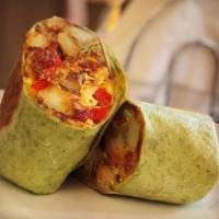 Breakfast Burrito · Eggs, sausage, home fried potatoes, bacon, cheese, onions and peppers in a tortilla wrap.
