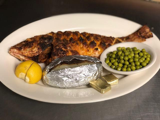 Broiled Whole Red Snapper · Free garlic bread with your order 