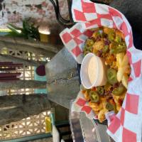 Loaded Fries · topped with cheddar, bacon and jalapenos with choice of ranch or spicy ranch