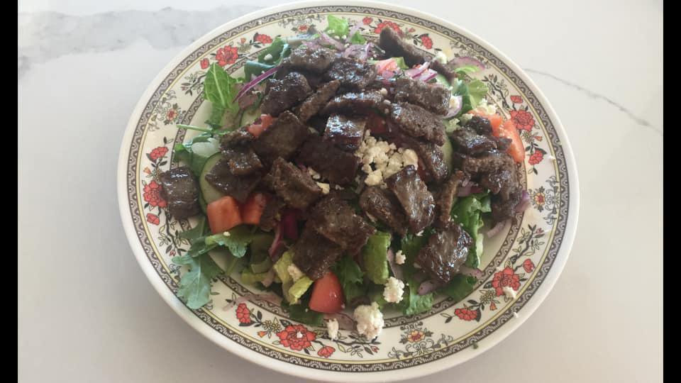29. Gyros Salad · Greek salad topped with beef and lamb gyros.