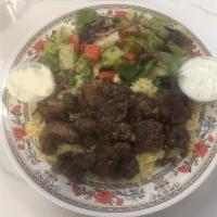 14. Chop Chop Chicken Liver · Chicken liver sautéed with garlic, lemon juice, and spices served with rice pilaf, salad, tz...