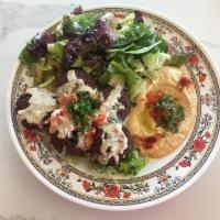 17. Falafel · Vegetarian. 5 falafel served with hummus and salad.