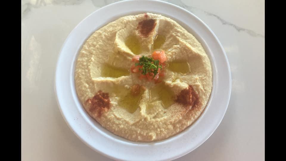31. Hummus · Garbanzo beans dip served with pita.