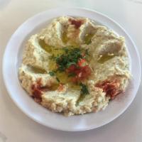 32. Baba Ghanouj · Fire roasted eggplant dip served with pita.