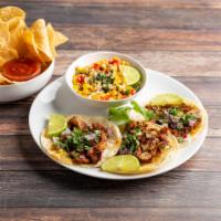 Al Pastor Pork Plate · 3 street tacos with pastor pork, onion and cilantro. Served with chips and salsa, steamed wh...