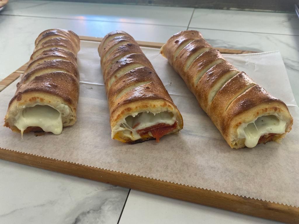Stromboli · Served with ham, salami and pepperoni.