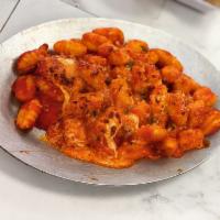 Gnocchi Sorrentina · Potato Gnocchi made with Fresh Mozzarella, Marinara Sauce, Parmigiano Cheese cooked in the o...