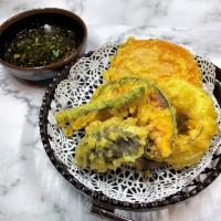 Vegetable Tempura · Vegetarian. Japanese style fried seasonal vegetables - 5 pcs - served with tempura sauce
