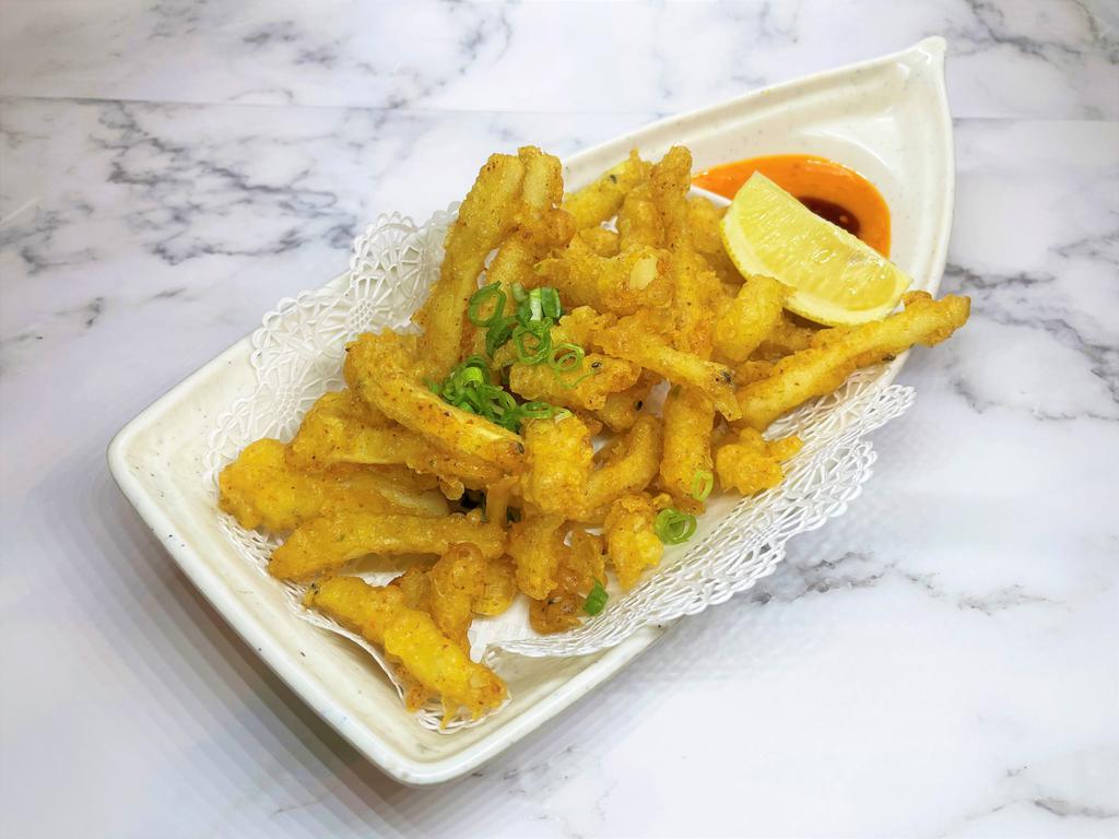 Calamari Tempura · Lightly fried calamari strips, Izakaya Hi style, with sweet chili dipping sauce
