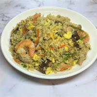 Japanese Fried Rice · Classic fried rice with egg and vegetables. Protein optional. 