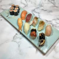 Signature Nigiri Combo · 9 pieces of nigiri (chef's choice, but usually: salmon, tuna, shrimp, albacore tuna, escolar...