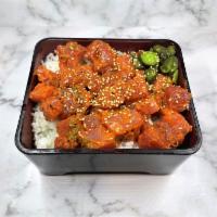 Spicy Tuna Don · Bowl of sushi rice with spicy tuna tossed in house spicy sauce, with oshinko (Japanese pickl...