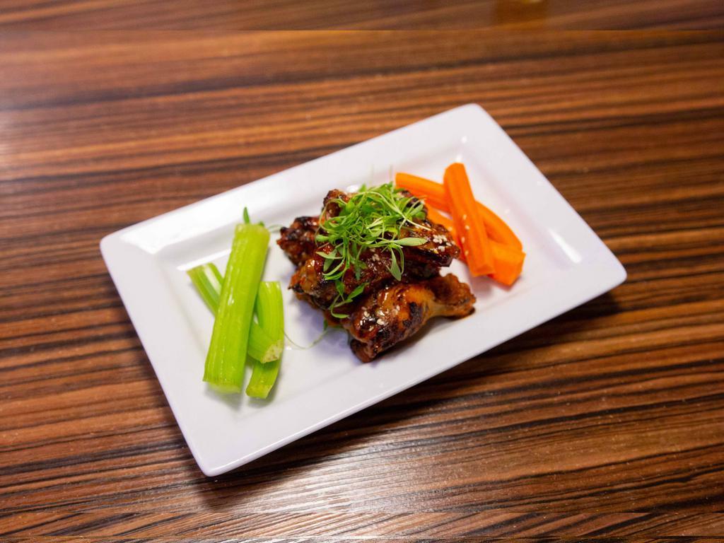 Sweet Chili Wings · Fresh jumbo drumettes and flats, charbroiled then marinated in our sweet chili sauce. Served with carrot and celery sticks and ranch dressing. A unique wing experience.